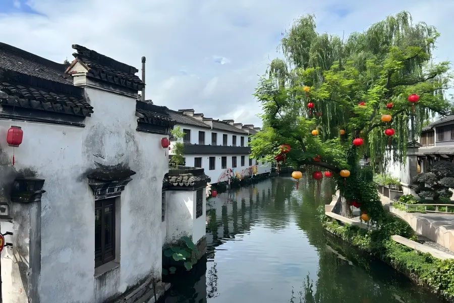 Zhouzhuang Water Town in Suzhou showing time?honored Jiangnan water?town landscapes with stone bridges and canal houses