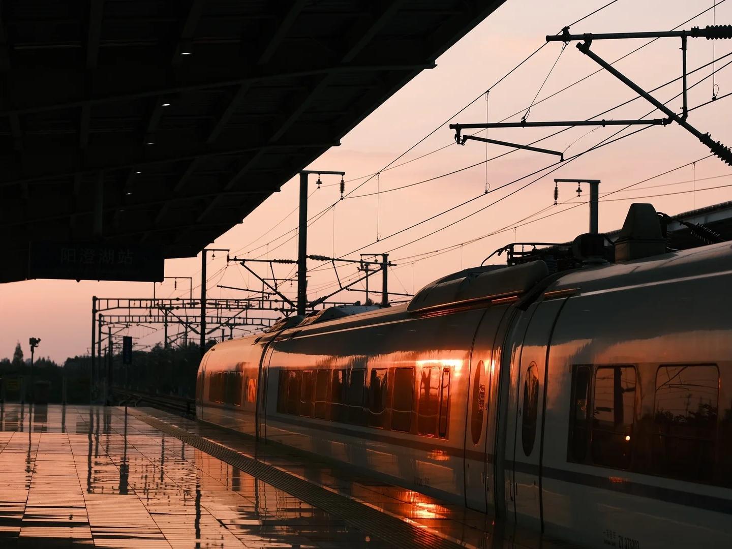 High?Speed Train at Yangchenghu Station Platform at Sunset
