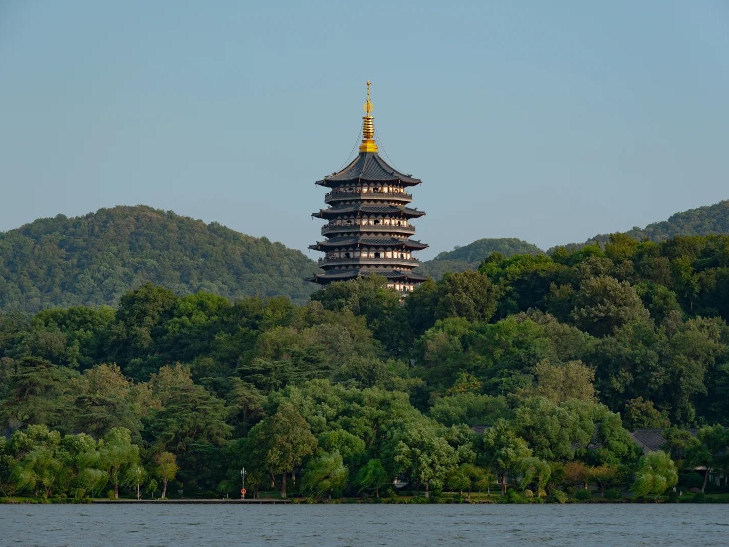 Leifeng Pagoda among green hills by West Lake