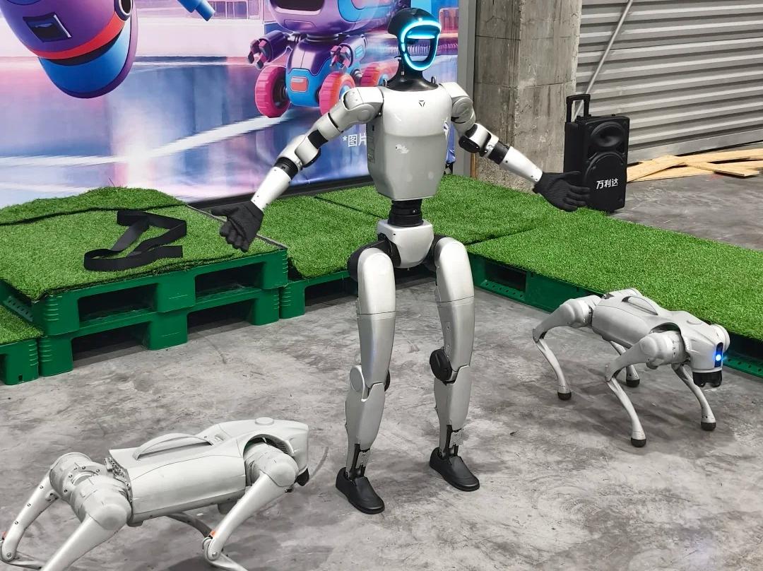 Humanoid robot and robot dogs on tech exhibition floor