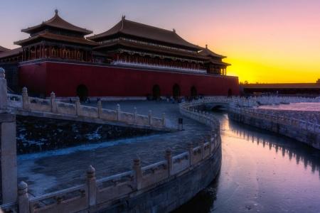 Forbidden City sunset view with red palace walls, ancient architecture