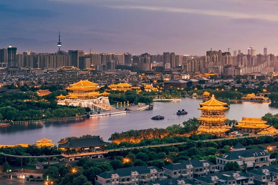 Tang Paradise with illuminated Tang-style pavilions and lake in Xi'an