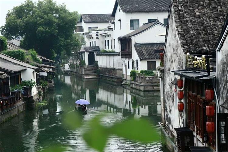 Xiaohe Street Historic Block Xiaohe Street in Hangzhou presenting white-walled black-tiled houses beside canal water