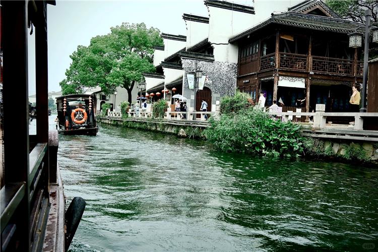 Nanxun Ancient Town in Huzhou Nanxun Ancient Town in Huzhou featuring tranquil authentic Jiangnan canal town with ancient stone bridges, waterside dwellings, combined Chinese-Western manors and profound silk merchant cultureTravelZom