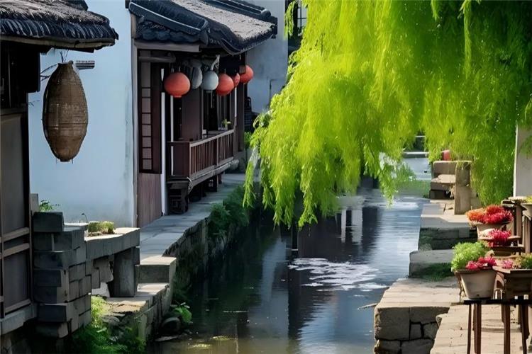 Morning mist scenery of Anchang Ancient Town, tranquil canals, empty bluestone streets and old wooden waterfront shops presenting slow-paced ancient town life