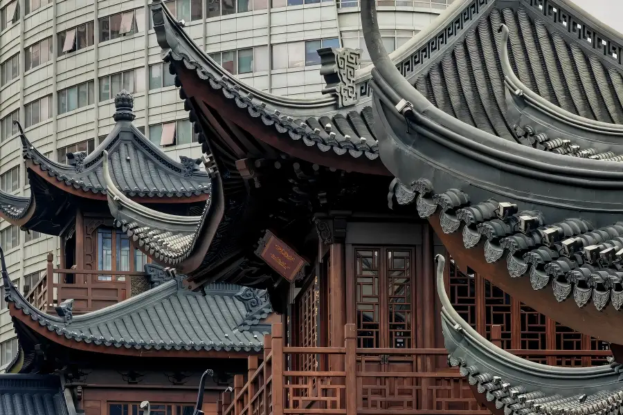 Jade Buddha Temple in Shanghai showing traditional ancient Buddhist architecture with yellow temple walls and red lanterns