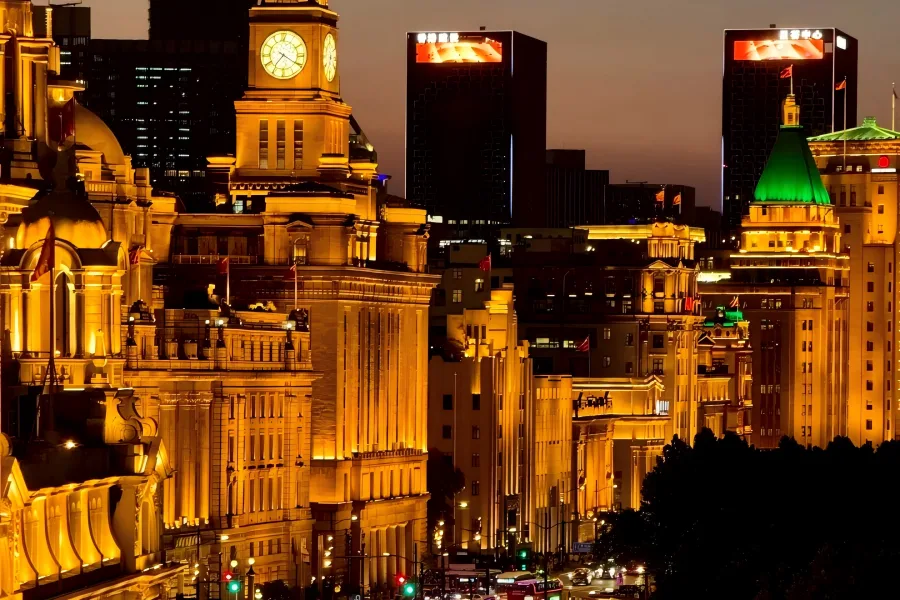 Century-old Bund Building Complex The Bund in Shanghai showing European-style historical buildings along the Huangpu River with distant modern skyscrapers
