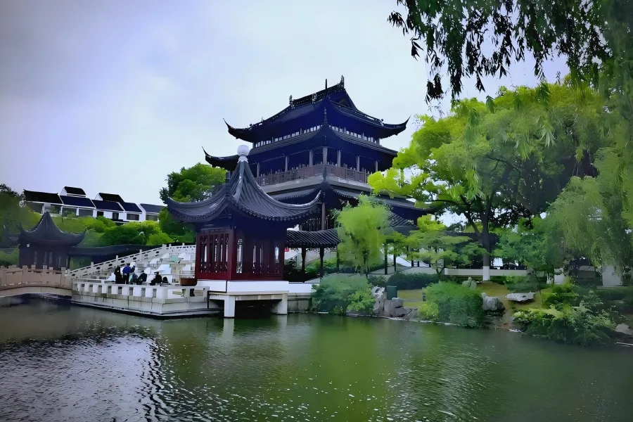 Suzhou Panmen Three Historic Landmarks Panmen Scenic Area in Suzhou showcasing China’s intact dual land-and-water ancient city gate, paired with Ruiguang Pagoda and grand Wumen Stone Arch Bridge along the Grand Canal