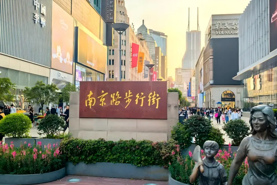 Nanjing Road in Shanghai showing bustling pedestrian streets and classic commercial buildings