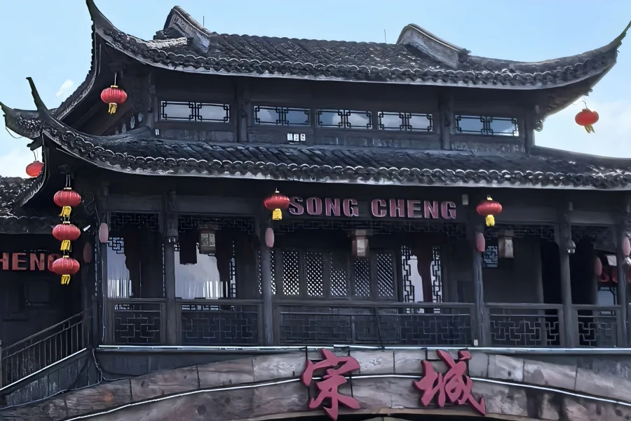 Songcheng Scenic Area in Hangzhou showing ancient Song-Dynasty style streets and immersive traditional cultural performances