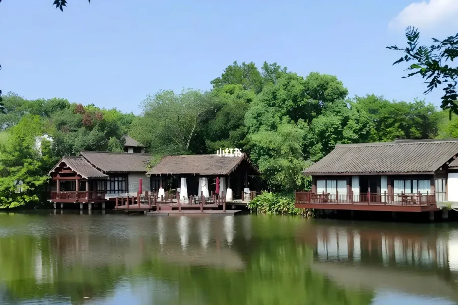 Xixi National Wetland Park in Hangzhou showing winding waterways, reed marshes and ancient waterfront folk houses