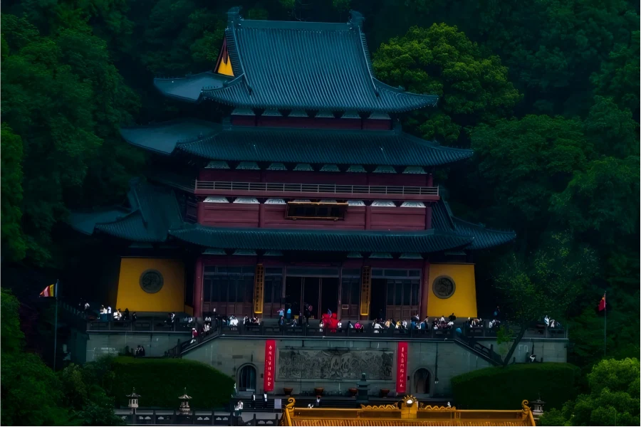Jingci Temple in Hangzhou displaying ancient Buddhist halls amid verdant lakeside woods