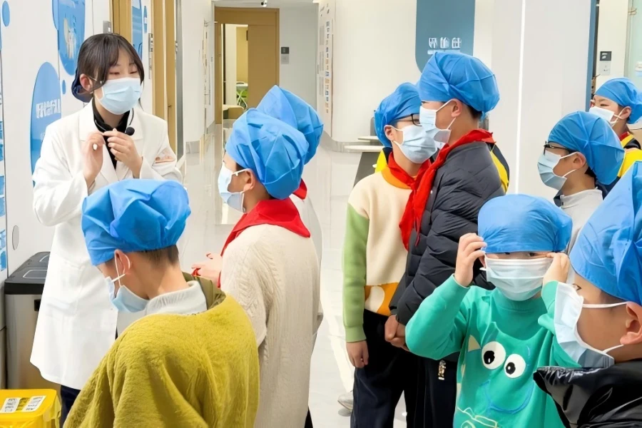 Students attend health lecture at pediatric dental hospital