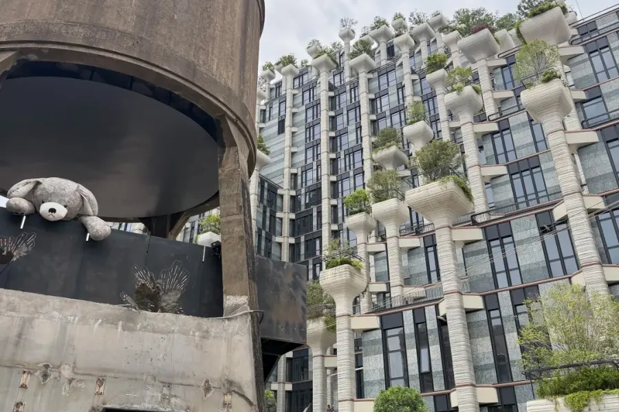 Former textile factory transformed into art district, featuring industrial buildings, galleries and street art along Suzhou Creek