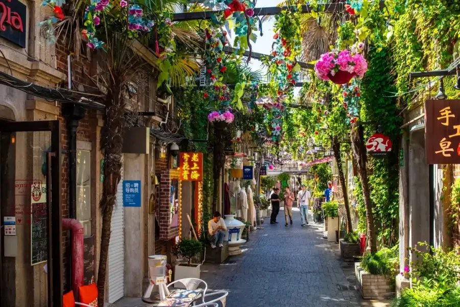Labyrinthine Shikumen alleyways with boutique shops, cafes and authentic old Shanghai lane life in former French Concession