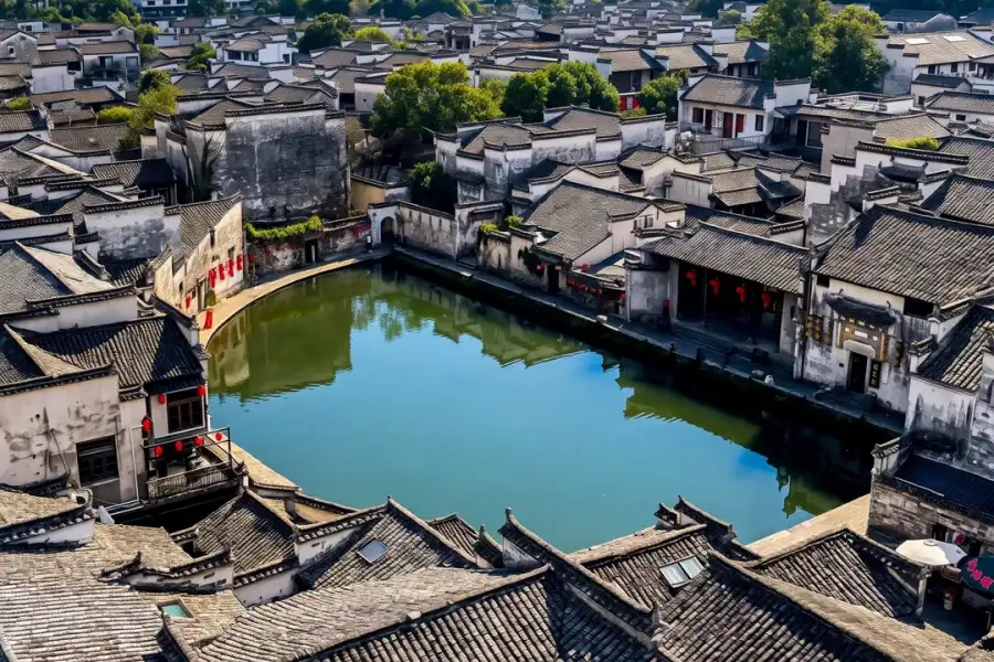 Hongcun Ancient Village UNESCO ancient Huizhou village, white walls and black tiles reflected in Moon Pond, known as village in Chinese paintings