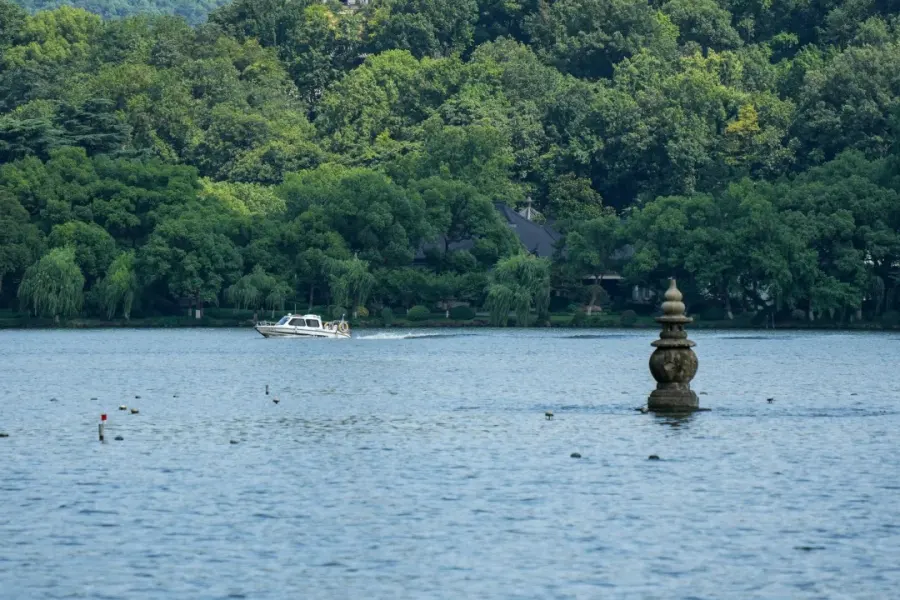 Hangzhou West Lake Scenic Area Iconic West Lake in Hangzhou, tranquil lakescape, ancient pagodas, bridges and timeless Jiangnan poetry scenery