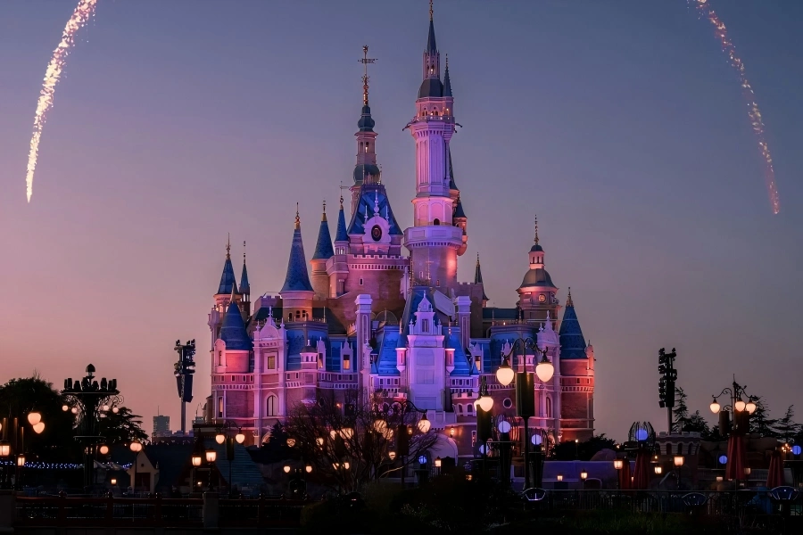 Shanghai Disneyland in Shanghai showing magnificent Enchanted Storybook Castle under blue sky