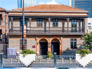 Exterior view of Shanghai Jewish Refugees Museum, vintage brick historic building