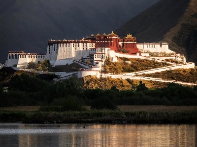 Golden Hour Sunset View of Potala Palace with Lake Reflection Tibetan Landmark Lhasa Tibet Trip