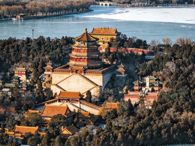 Aerial view of Beijing Summer Palace, grand Foxiang Pavilion with ancient palaces and wide Kunming Lake