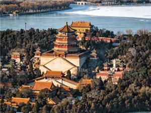 Aerial view of Beijing Summer Palace, grand Foxiang Pavilion with ancient palaces and wide Kunming Lake