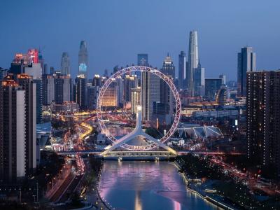 The Eye of Tianjin at Night and the Panoramic View of Tianjin City