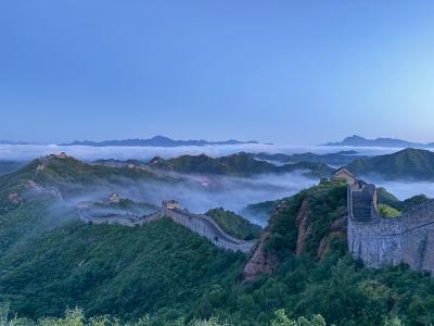 Jinshanling Great Wall Snaking Over Green Mountains With Flowing Sea Of Clouds Early Morning Blue Sky View
