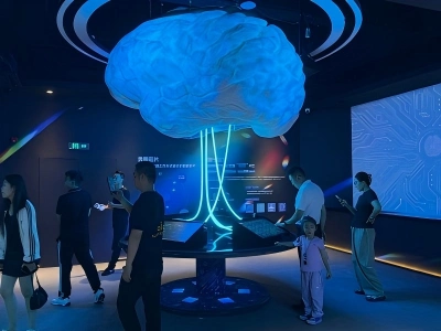 Visitors explore AI exhibition at Hangzhou Qiushi AI Exploration Museum