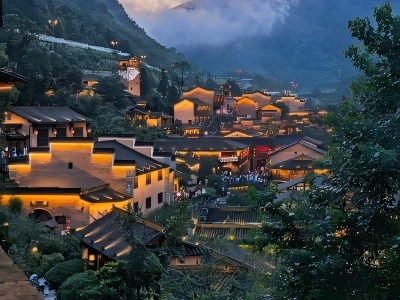 Panoramic night scenery of mountain?side ancient town Wangxiangu