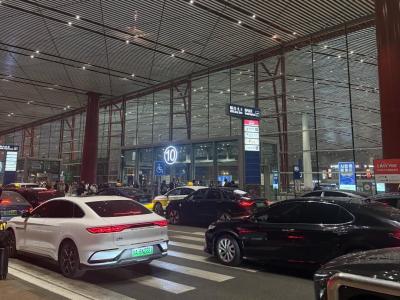 Ride-hailing vehicles waiting to pick up passengers at Beijing Capital International Airport