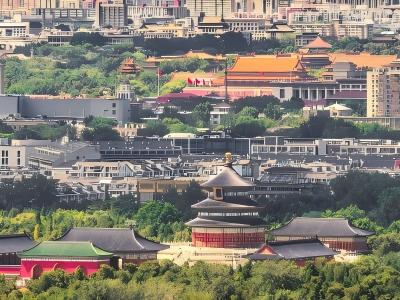 Panoramic elevated view of Temple of Heaven Hall of Prayer for Good Harvests against Beijing city skyline