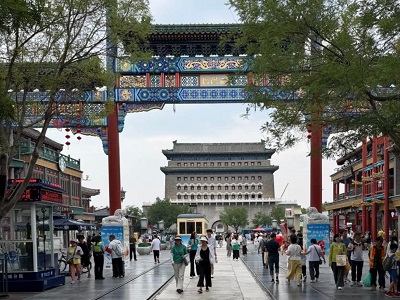 Qianmen Street bustling with people during the day