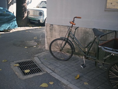 Beijing hutong alley with traditional bicycle