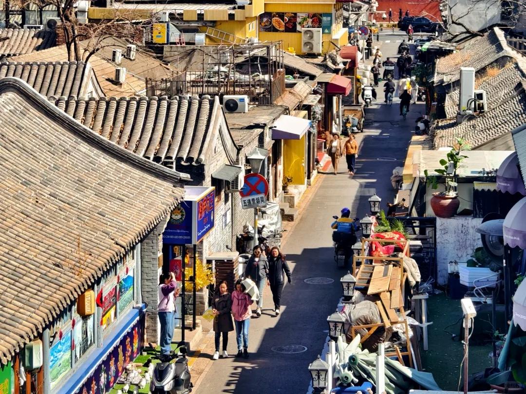 The bustling commercial street in Wudaoying Hutong