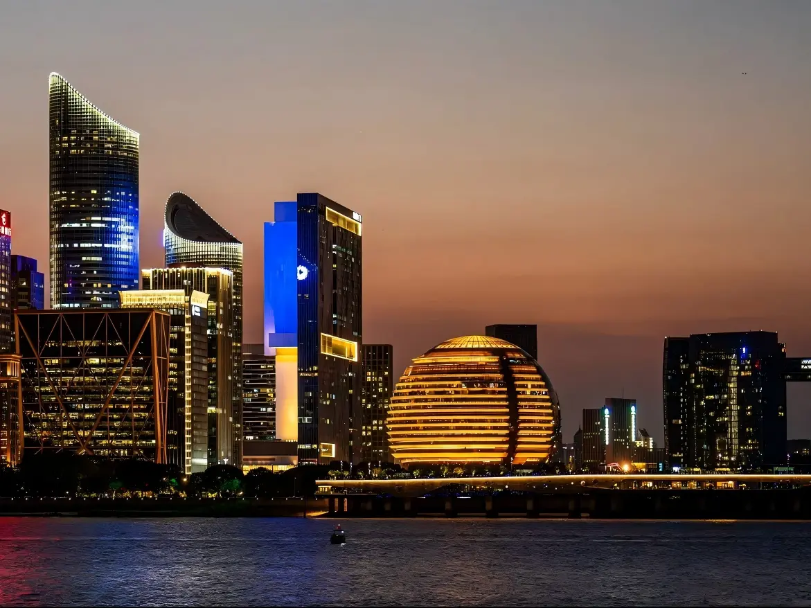 Golden spherical Hangzhou International Conference Center in Qianjiang New Town dusk scenery