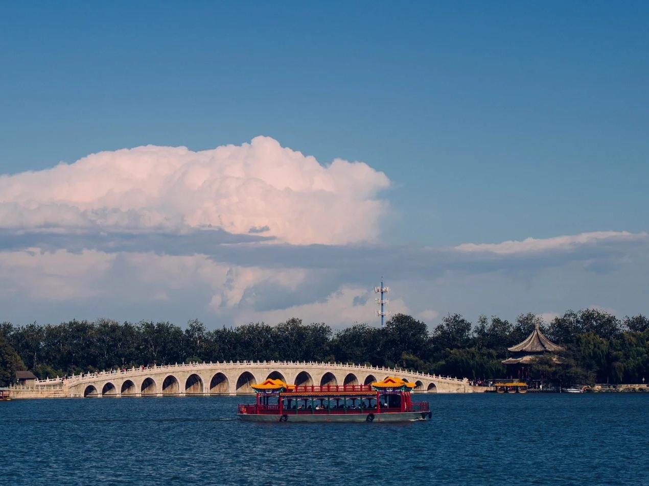 Seventeen?Arch Bridge and cruise boat in Summer Palace